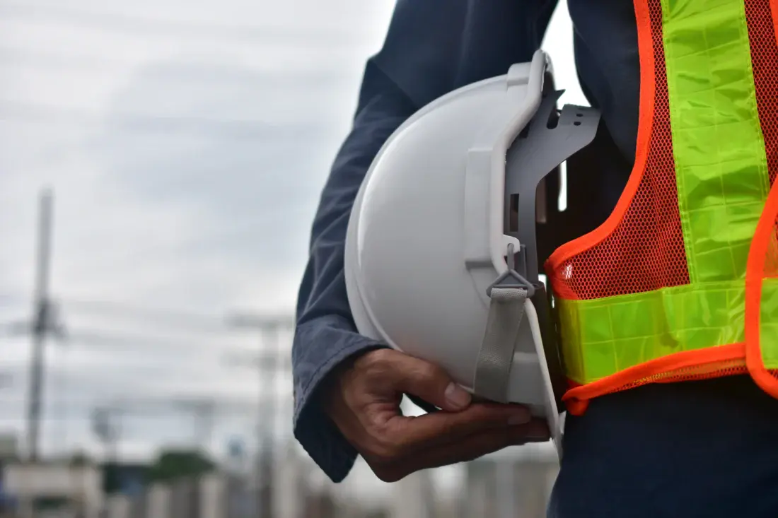 construction-staff-holding-a-helmet