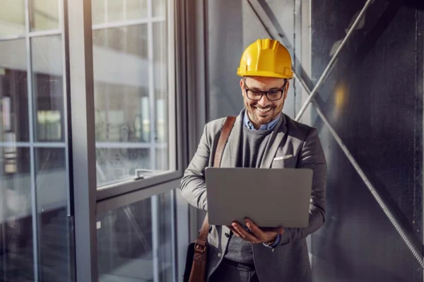 blog-image-0011 | Fast Labour Hire Construction manager using laptop at building site