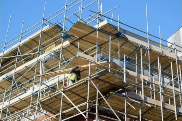 An image of a construction site with scaffolding